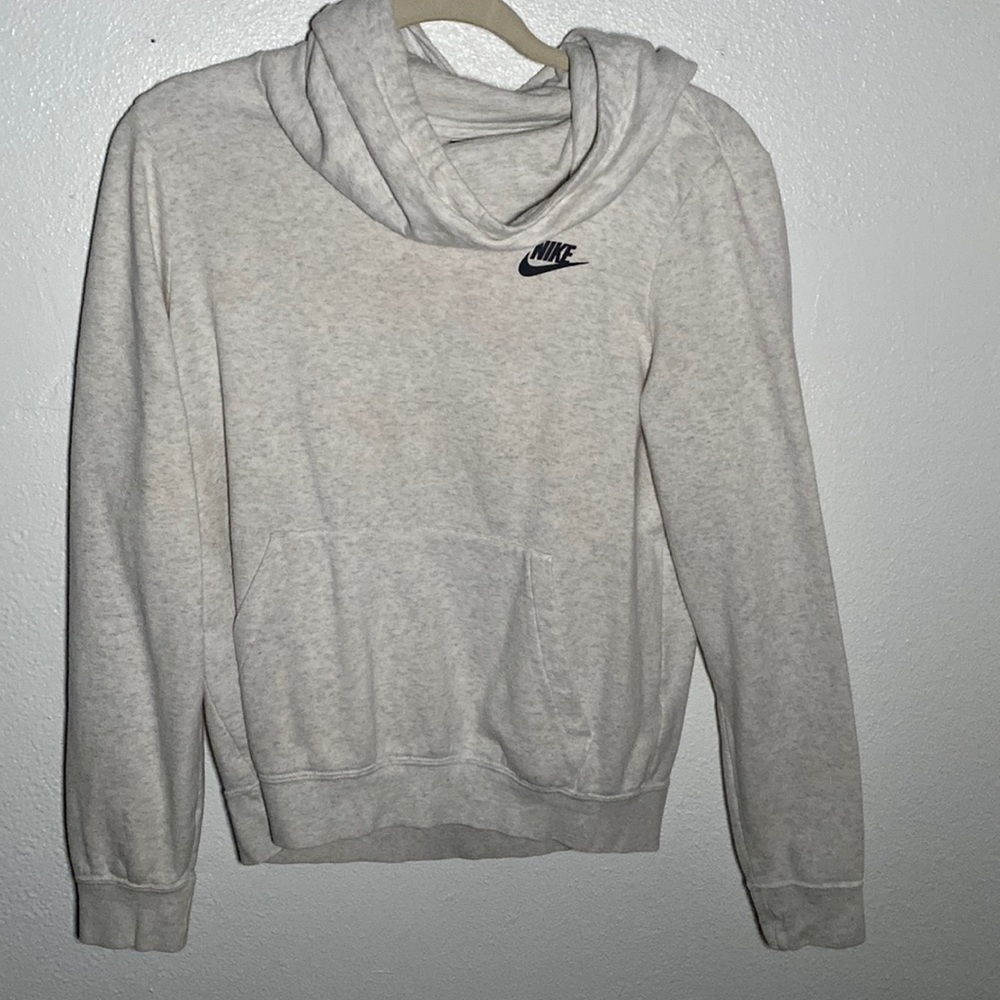 White /cream Nike hoodie it looks more cream but some might say it’s white